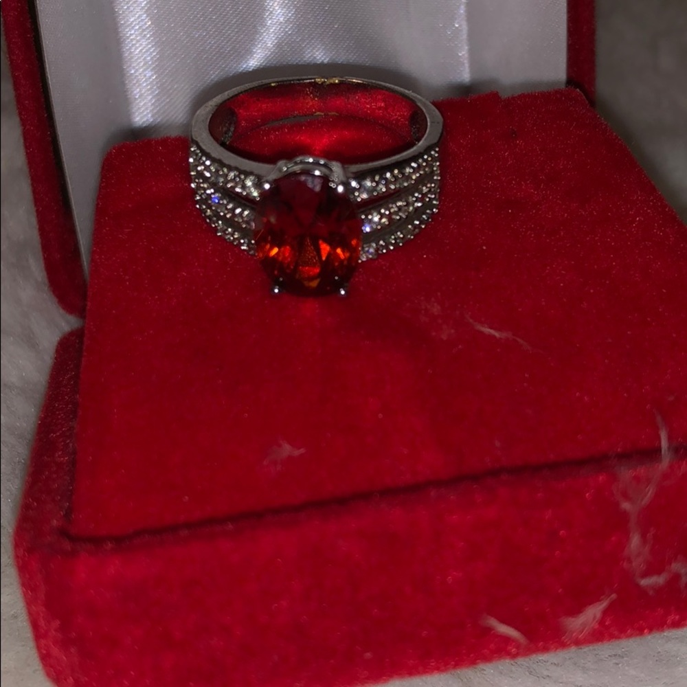 Silver unsex ring size 10 with red olive shape